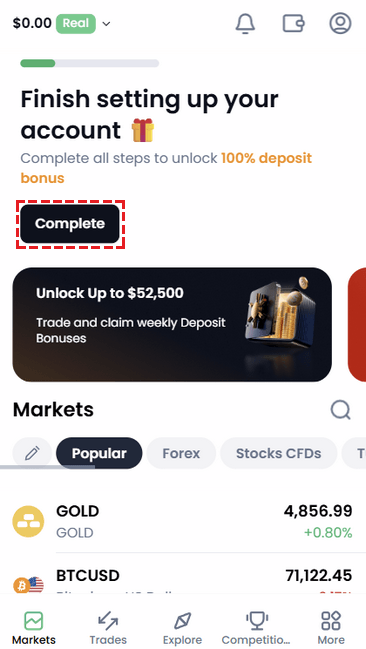 XM trading screen showing the location of the Complete button for identity verification in the top right corner